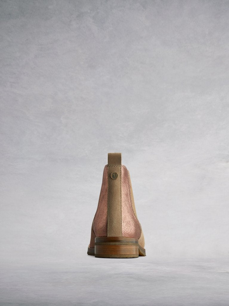 The back features a narrow contrasting camel suede panel and pull-tab.