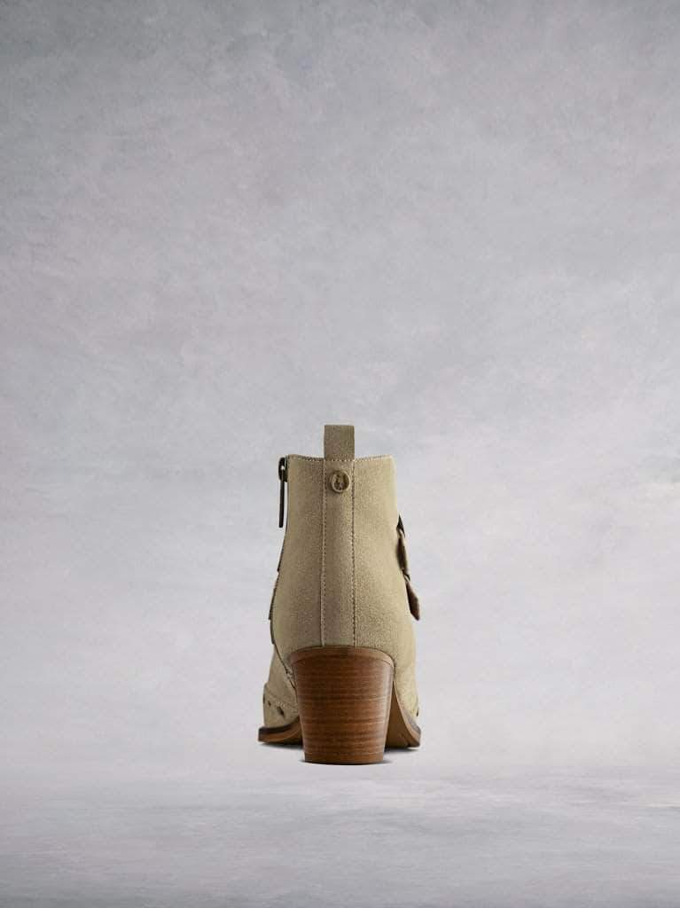 This taupe ankle boot features a comfortable mid-height stacked Cuban heel.