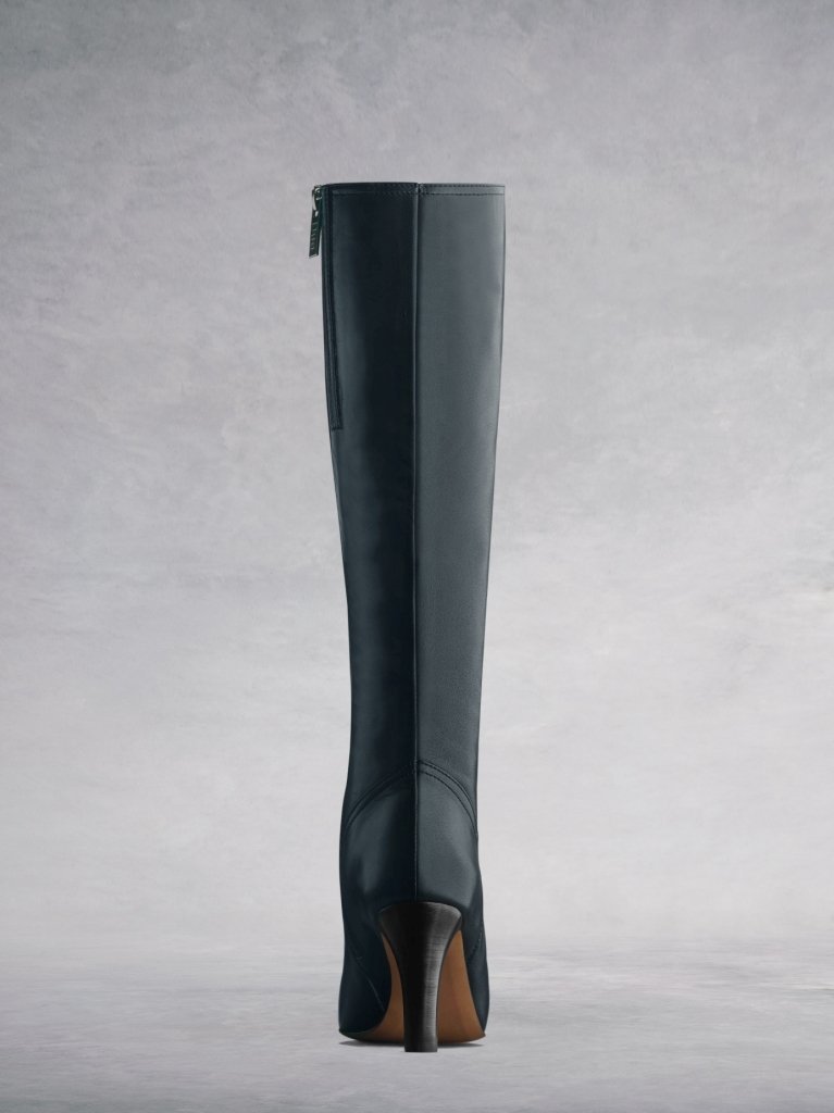 The navy Luxor features a flattering lower back from the curved topline.