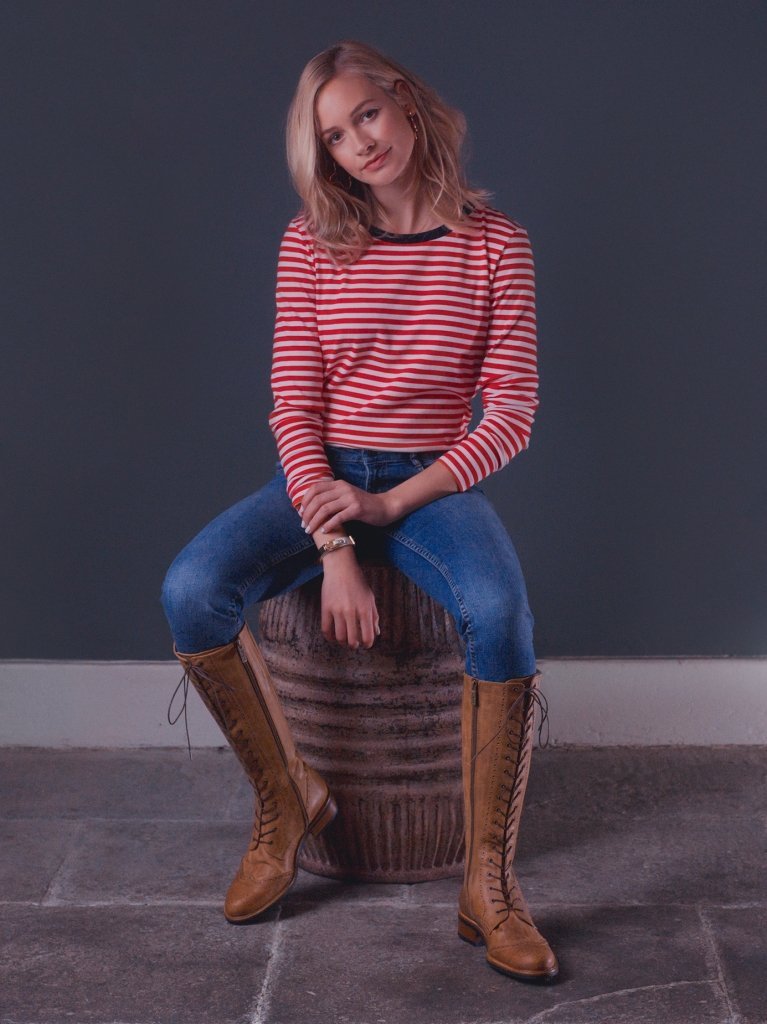 The tan lace up front allows the boot to be tailored to any ankle shape.