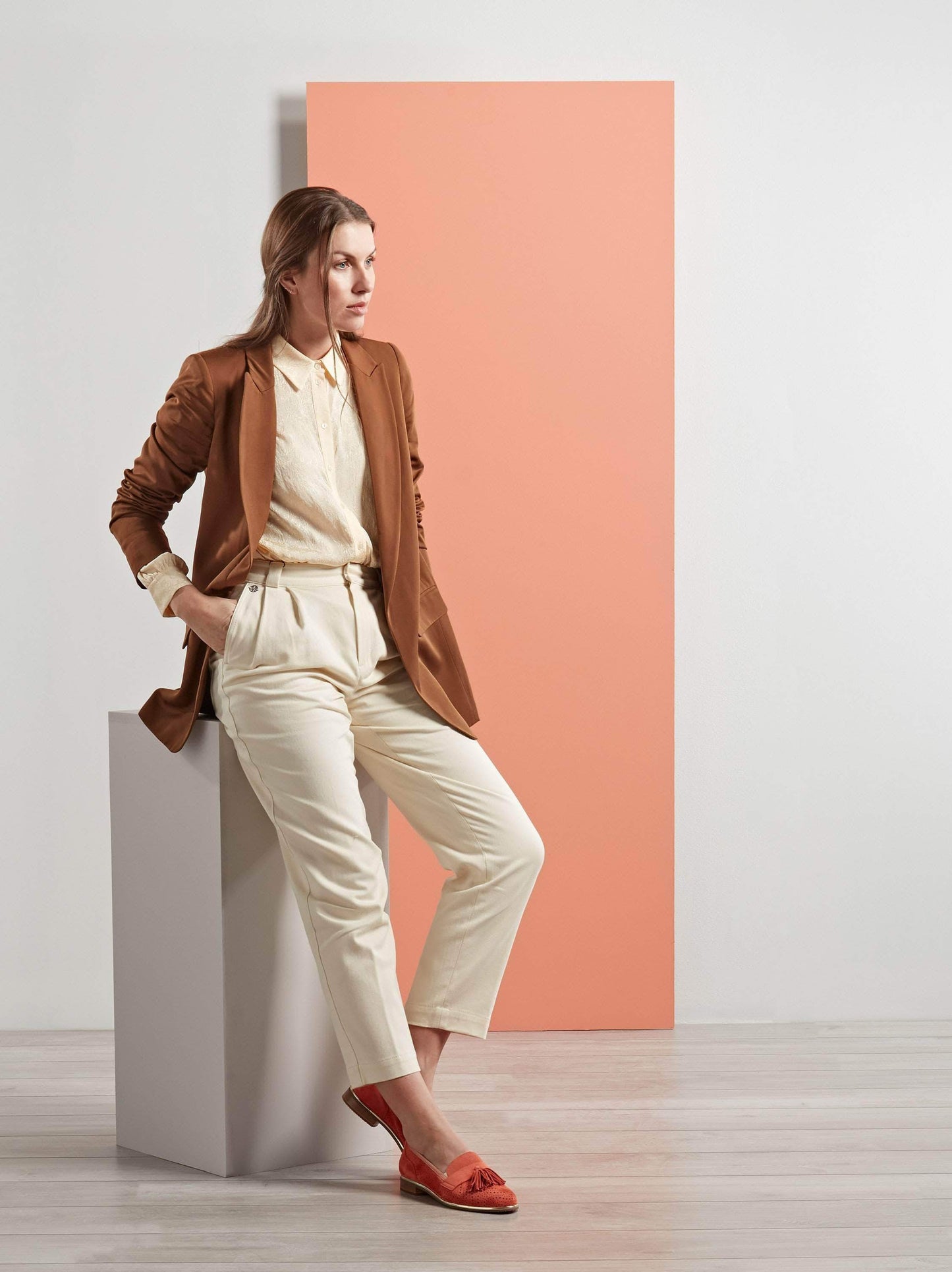 Our chic Milford loafer in coral orange suede will complete your outfit in style.