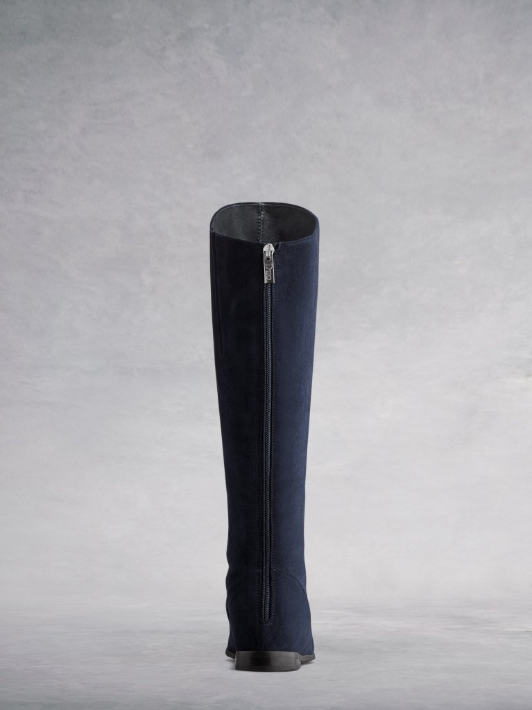The navy Raven has a subtle zip down the back, and an asymmetric front.