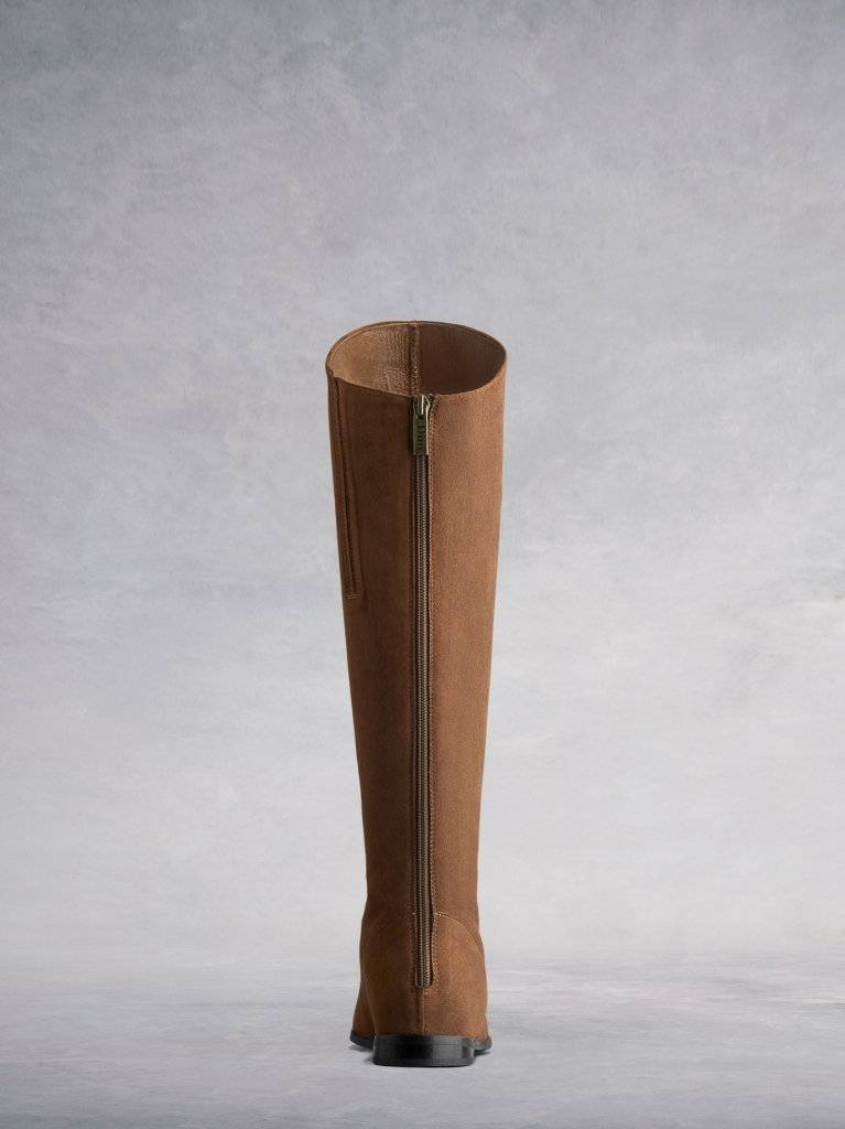 The tan Raven has a subtle zip down the back, and an asymmetric front.