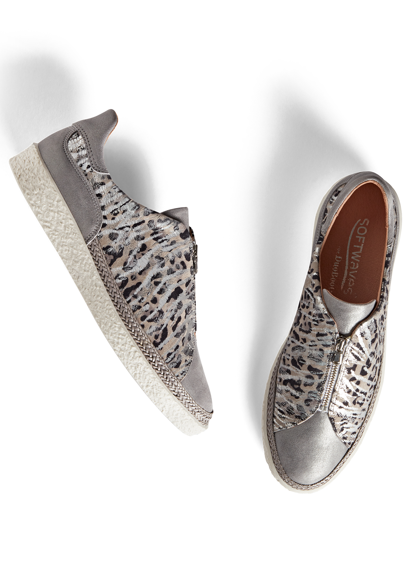 Ryde, a statement silver trainer with a safari print and central zip detailing.