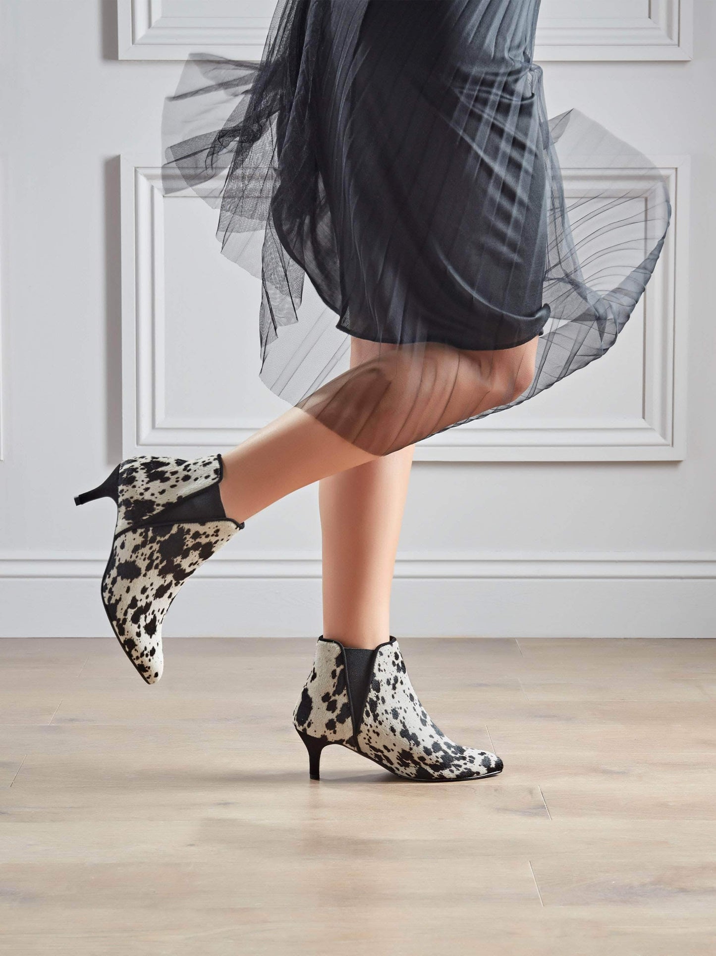 Our Somerton kitten heel Chelsea boot, go bold in cow print hair leather.
