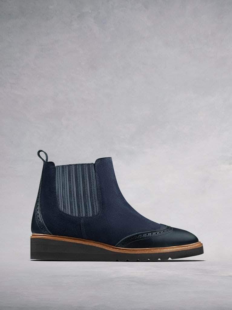 Abril - our brogue detailed Chelsea boot in navy leather and suede.