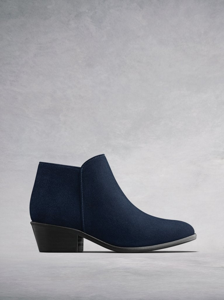 The Albus, the simple yet stylish low cut navy suede ankle boot.