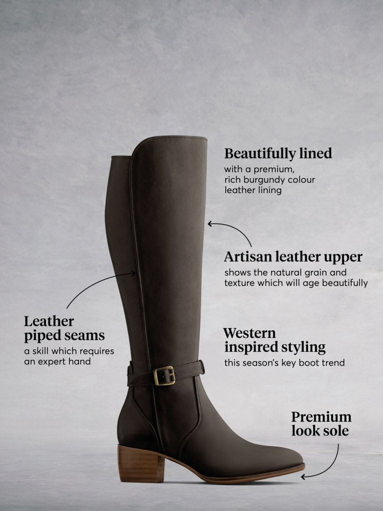 The brown leather boot has a contrasting lighter brown premium sole. 