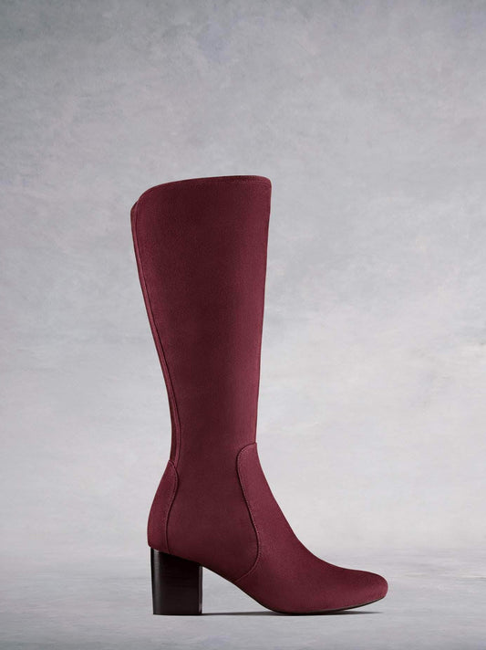 Avocet, our burgundy suede women’s knee high boots with a mid-height block heel. Available in a wide range of calf sizes.