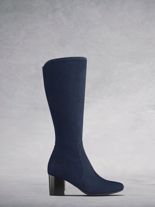 The Avocet, a knee high navy soft suede boot with a block heel.