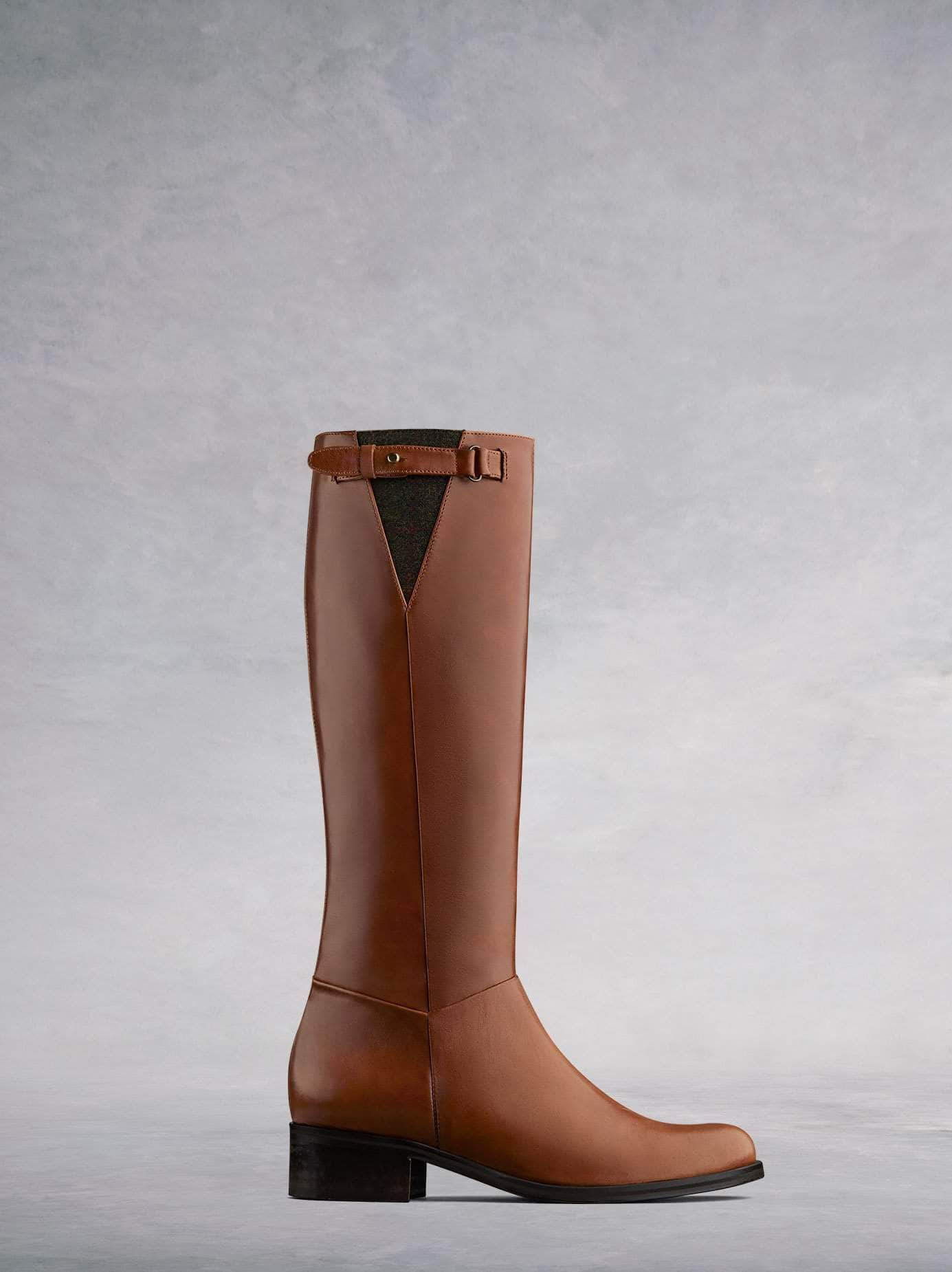 Axbridge, our smart tan leather knee high riding boot with tweed detailing. Available in a wide range of calf sizes.