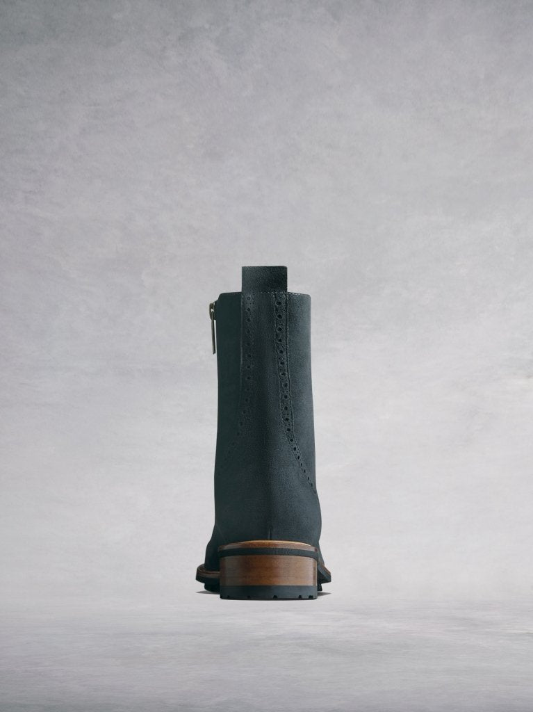 Balla grey has a contrast brown heel against the black rubber tread sole.