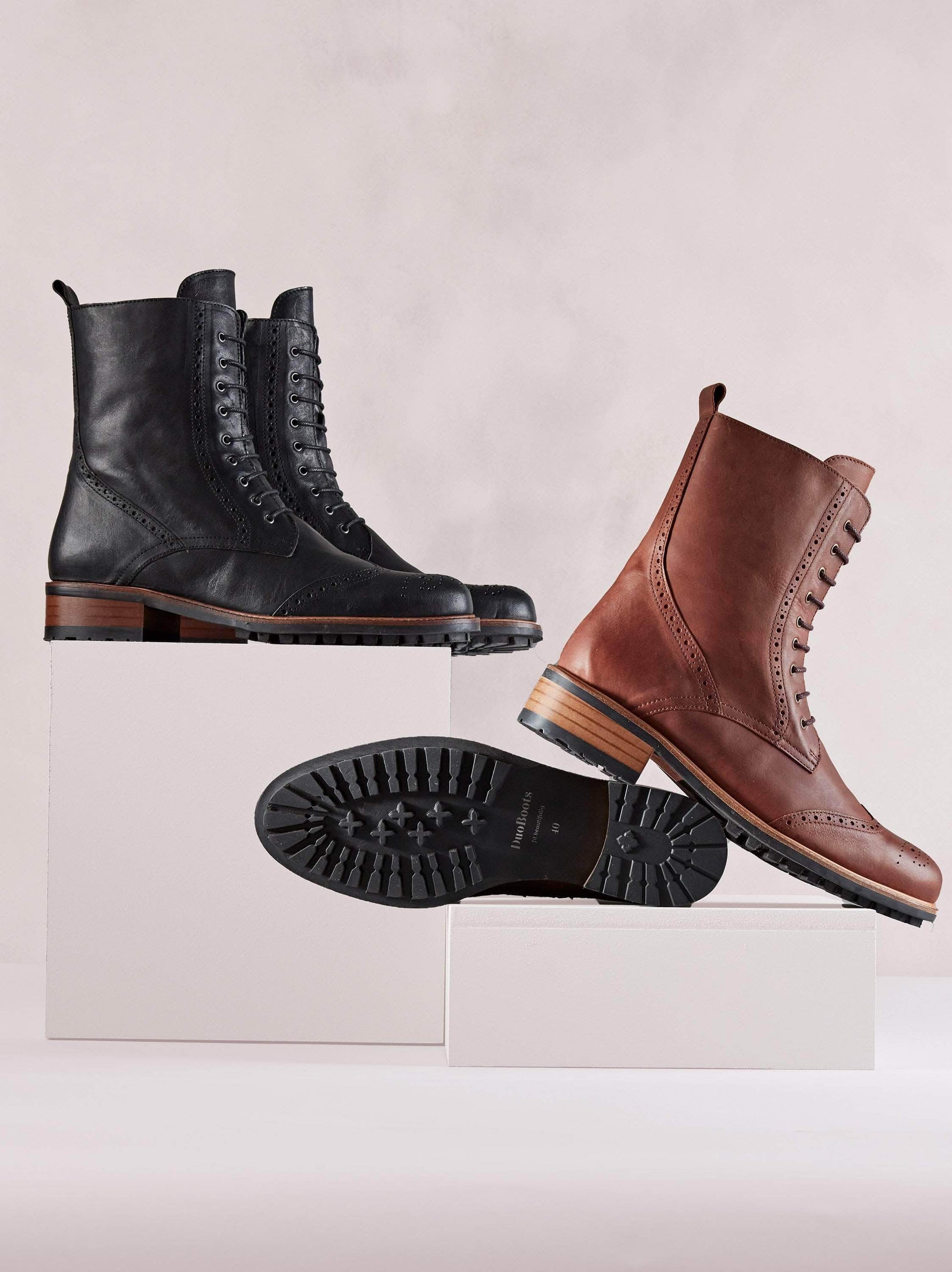 Chestnut leather ankle boot with a leather trim around the practical rubber tread sole.