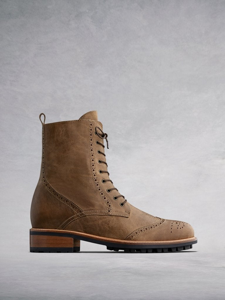 Balla, our brogue inspired tan leather lace up ankle boot. 
