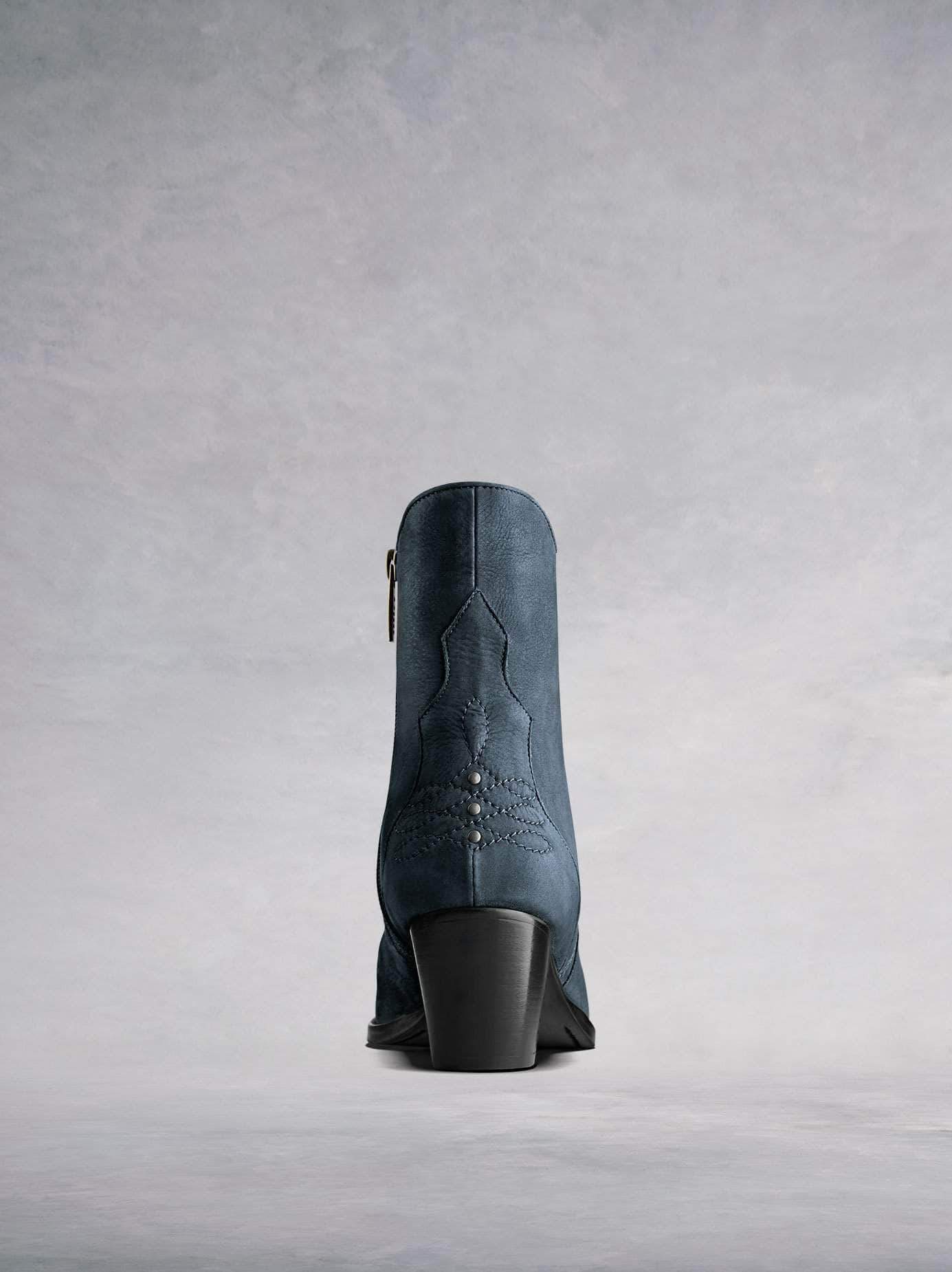 Bexley has a contrast black heel against the petrol blue nubuck leather.