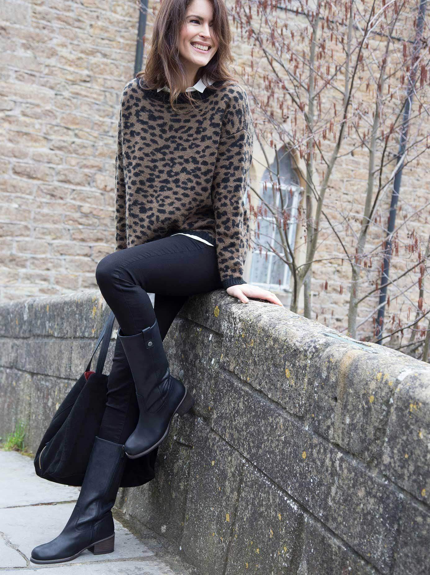 Brampton - a mid calf, western inspired casual black leather boot. 