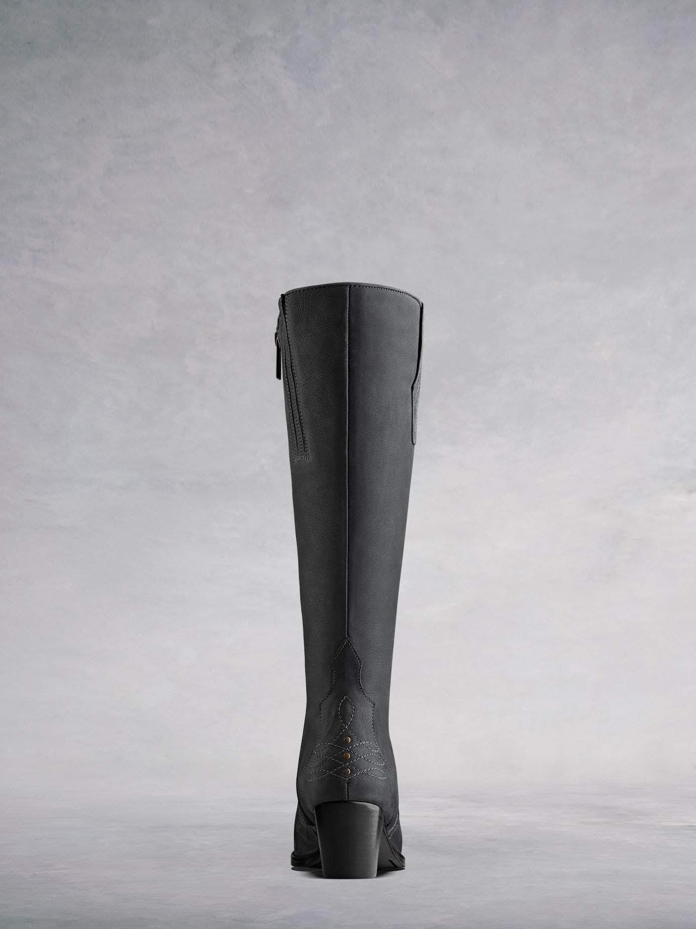 This grey nubuck Western inspired boot has a burgundy calf leather lining.