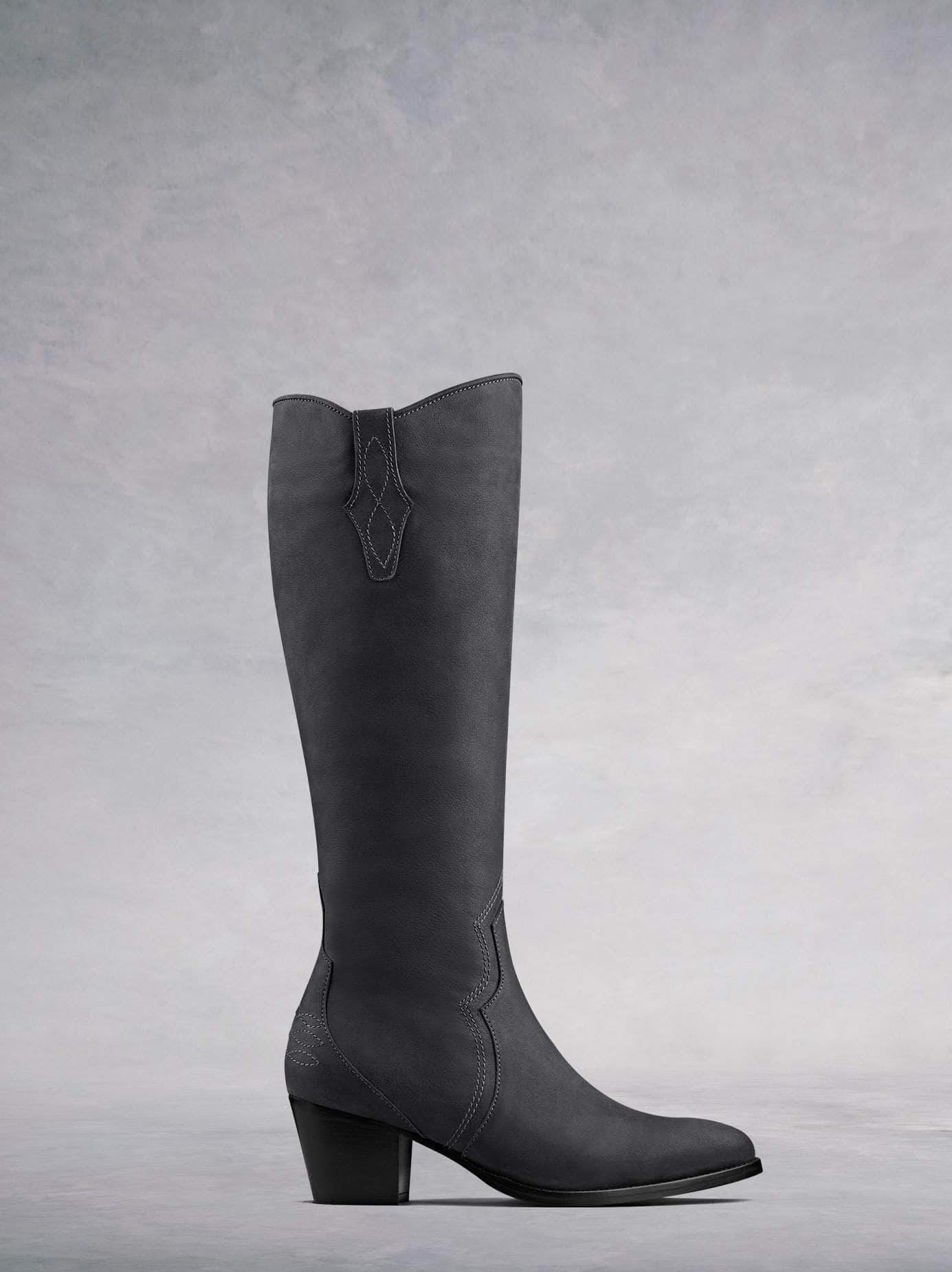 Buckland, our elegant Western-inspired knee high boot crafted from grey nubuck leather with intricate detailing. Available in a wide range of calf sizes.