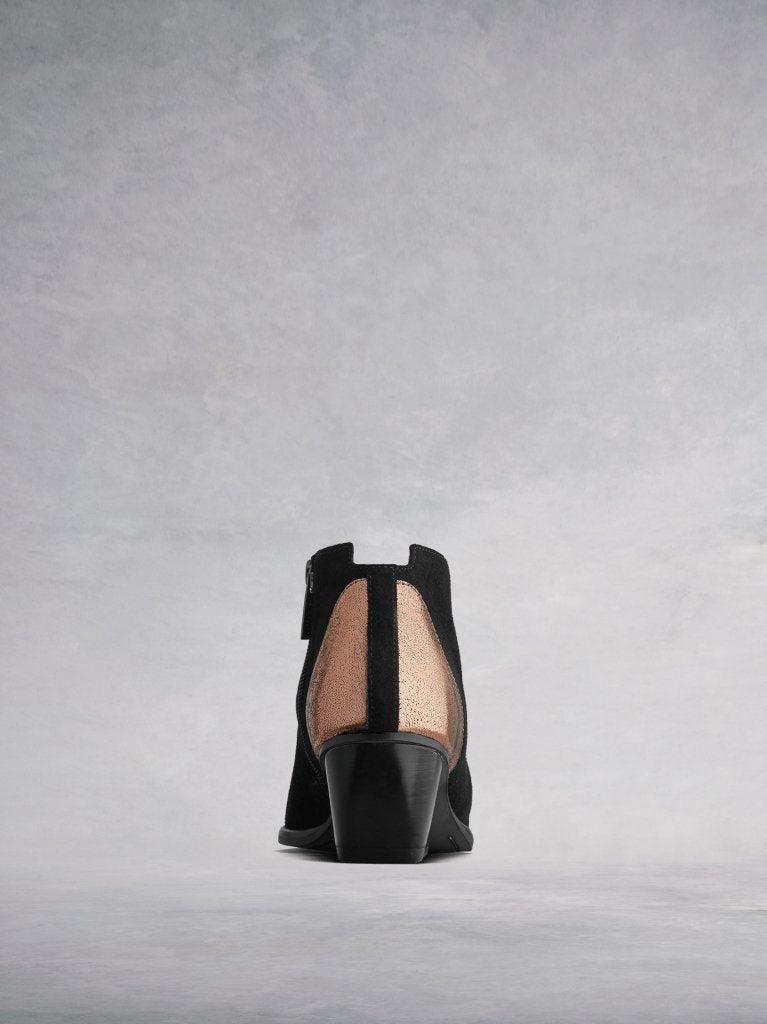 Buell has metallic detailing at the back with a central black suede panel. 