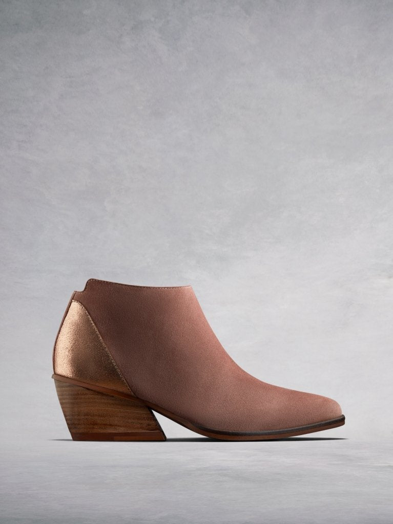 Buell, our blush pink suede low-cut ankle boot with a metallic counter. 