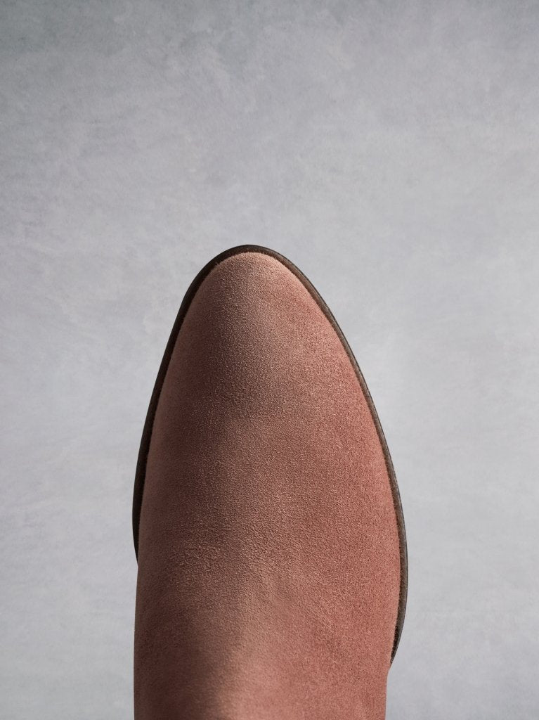 Buell pink features an almond toe shape, offset by a unique angular heel.