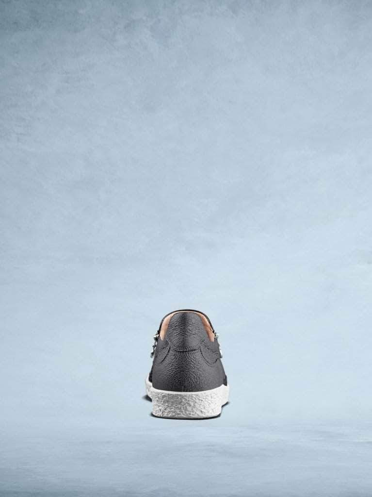 This stylish slate grey leather trainer has a simple, easy to wear design. 