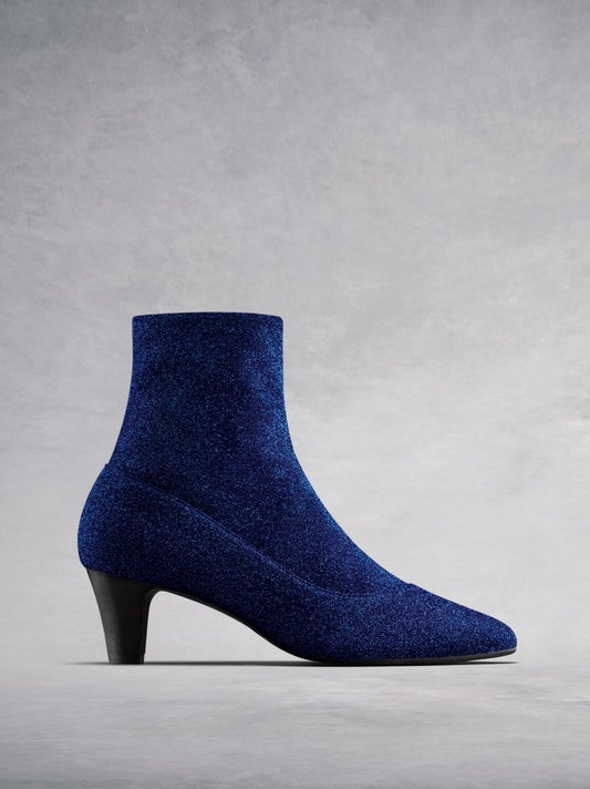 " The Dalby, our on-trend sleek sock ankle boot in sparkly blue fabric. "