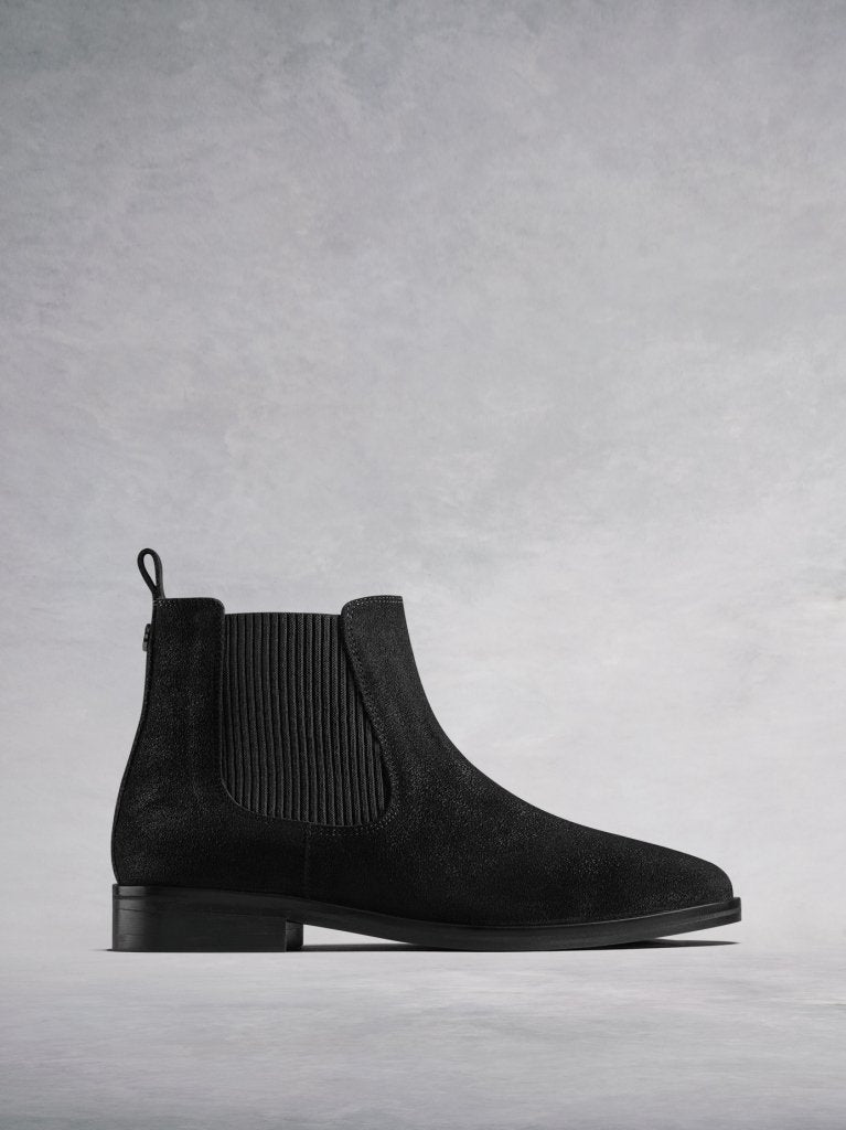 The Darwin, a versatile black suede Chelsea ankle boot with an edge.