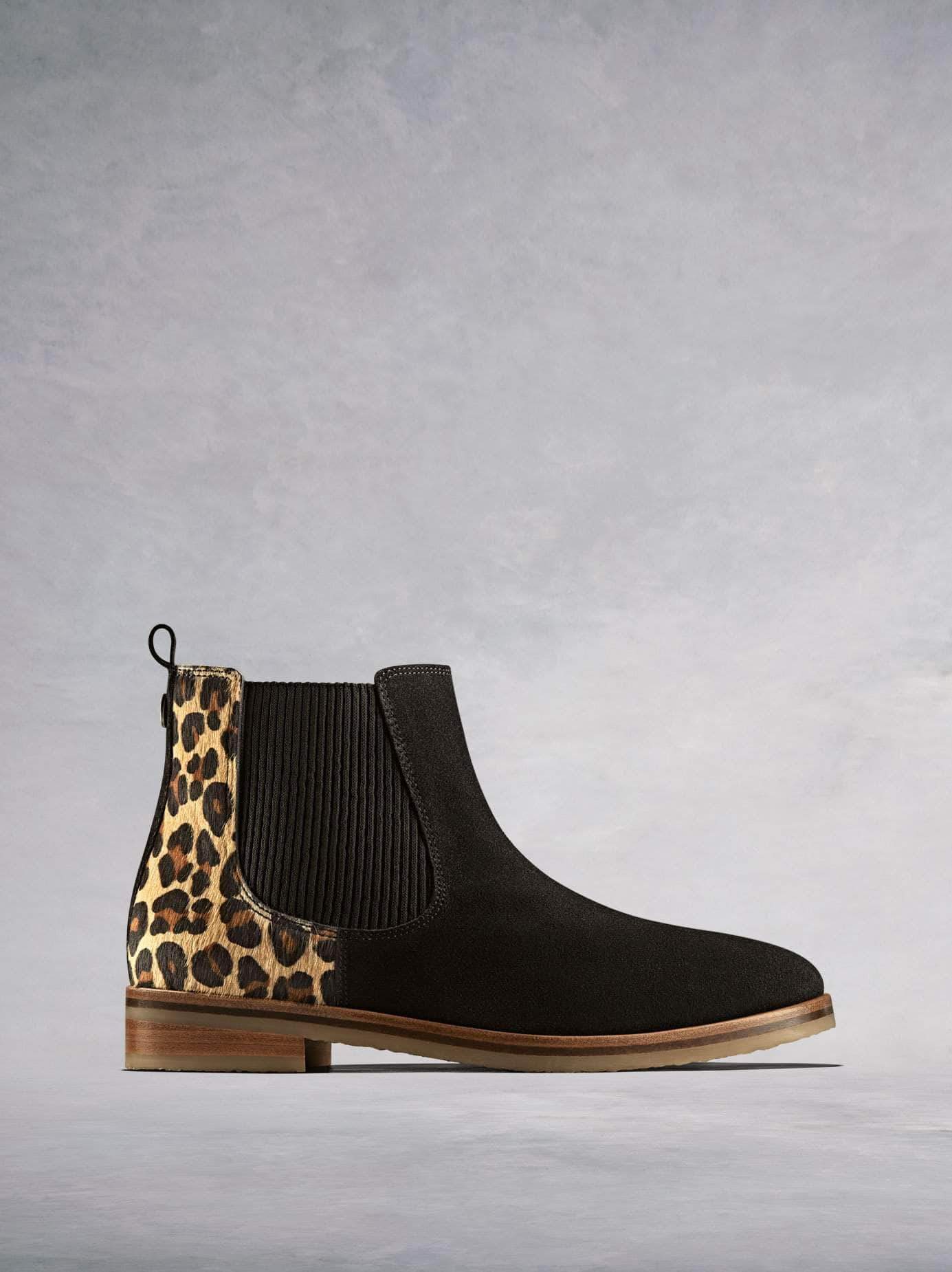 Darwin is a versatile black Chelsea ankle boot with a leopard print twist.