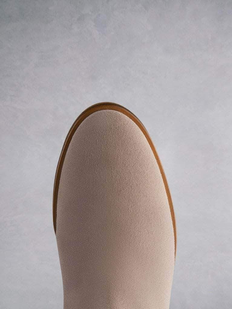 The Darwin pink has a comfortable round toe and a crepe look sole.