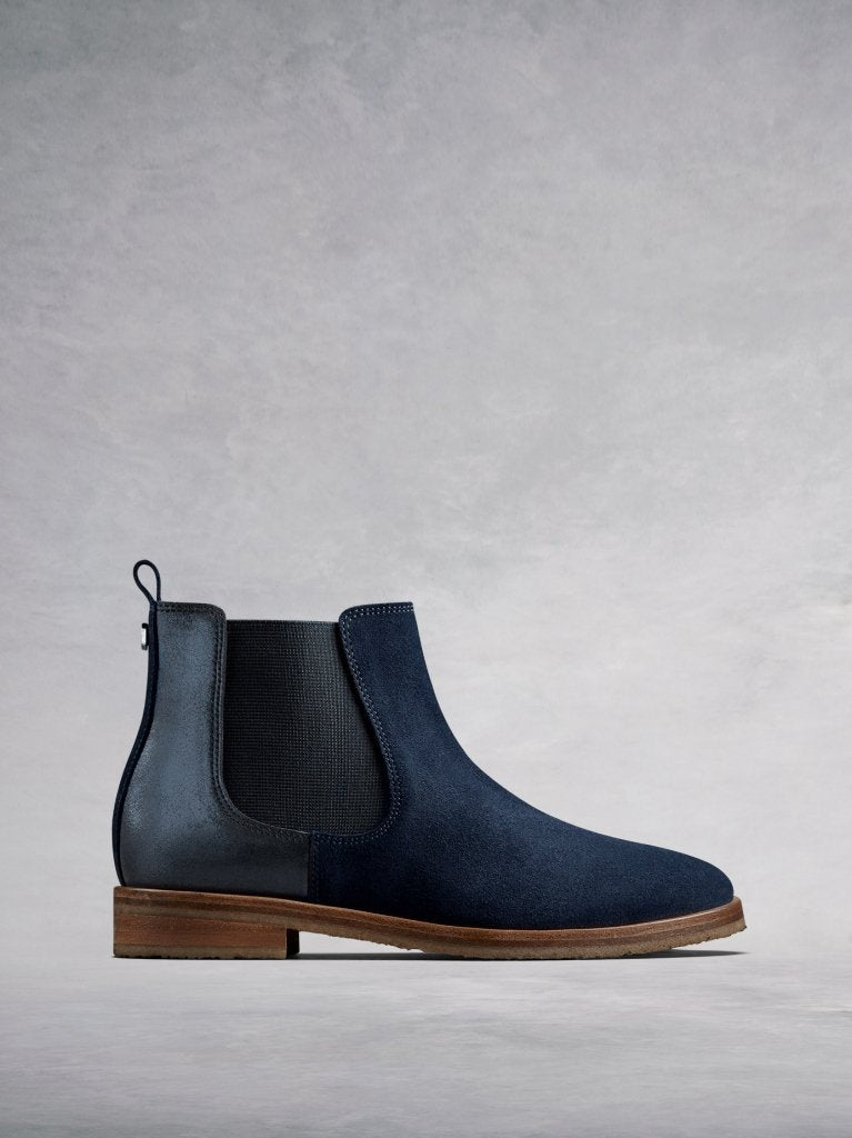 The Darwin, a versatile navy suede Chelsea ankle boot with an edge.