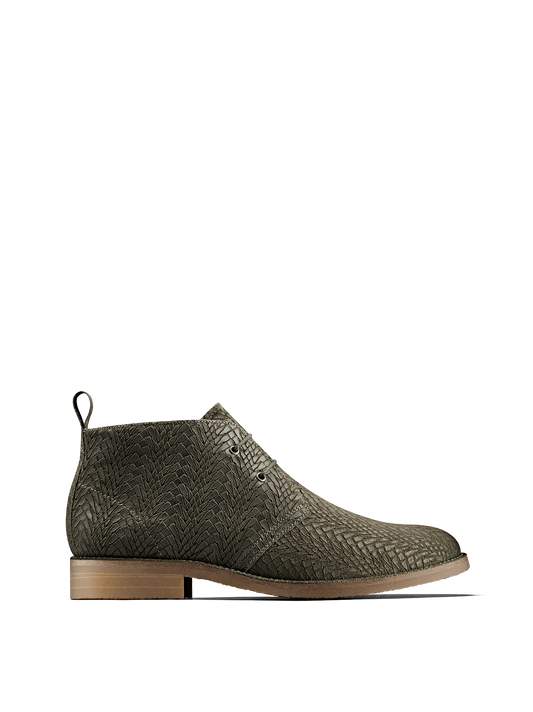 Delmore is a versatile desert boot in khaki embossed suede with elasticated laces.
