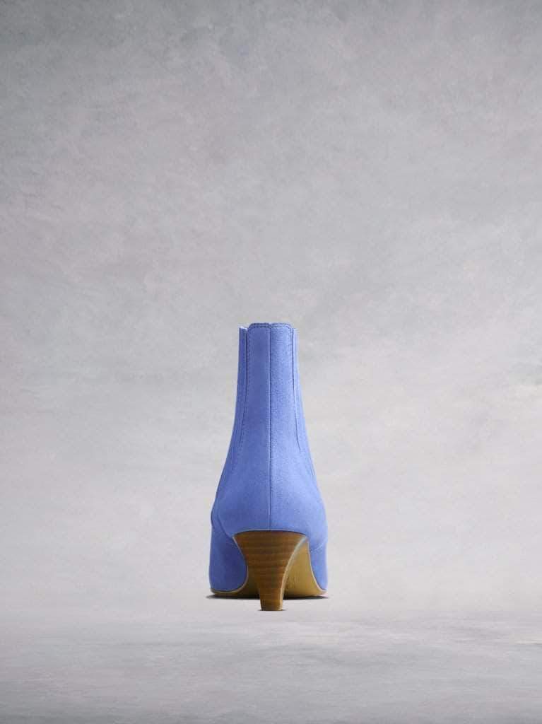This pastel ankle boot features a slim, square shaped, low Italian heel. 