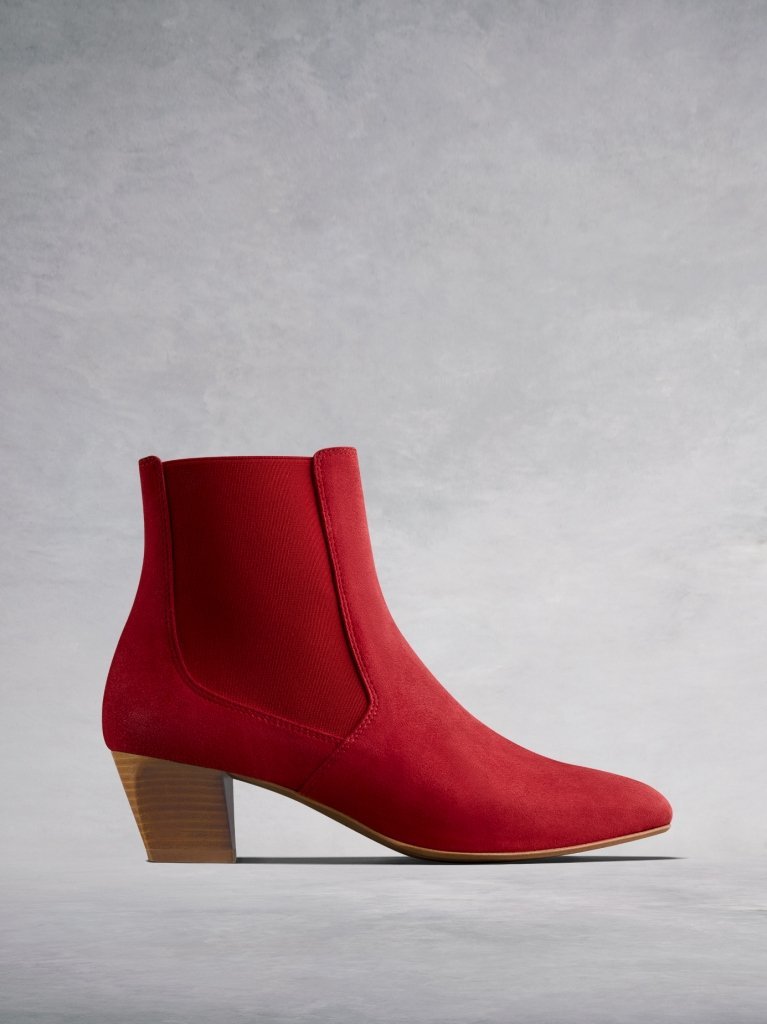 The Edison, a modern take on a classic Chelsea boot in soft red suede.