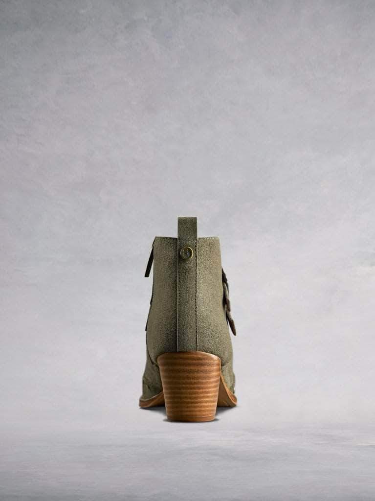 Our Emilia in khaki suede features a comfortable mid-height stacked Cuban heel.