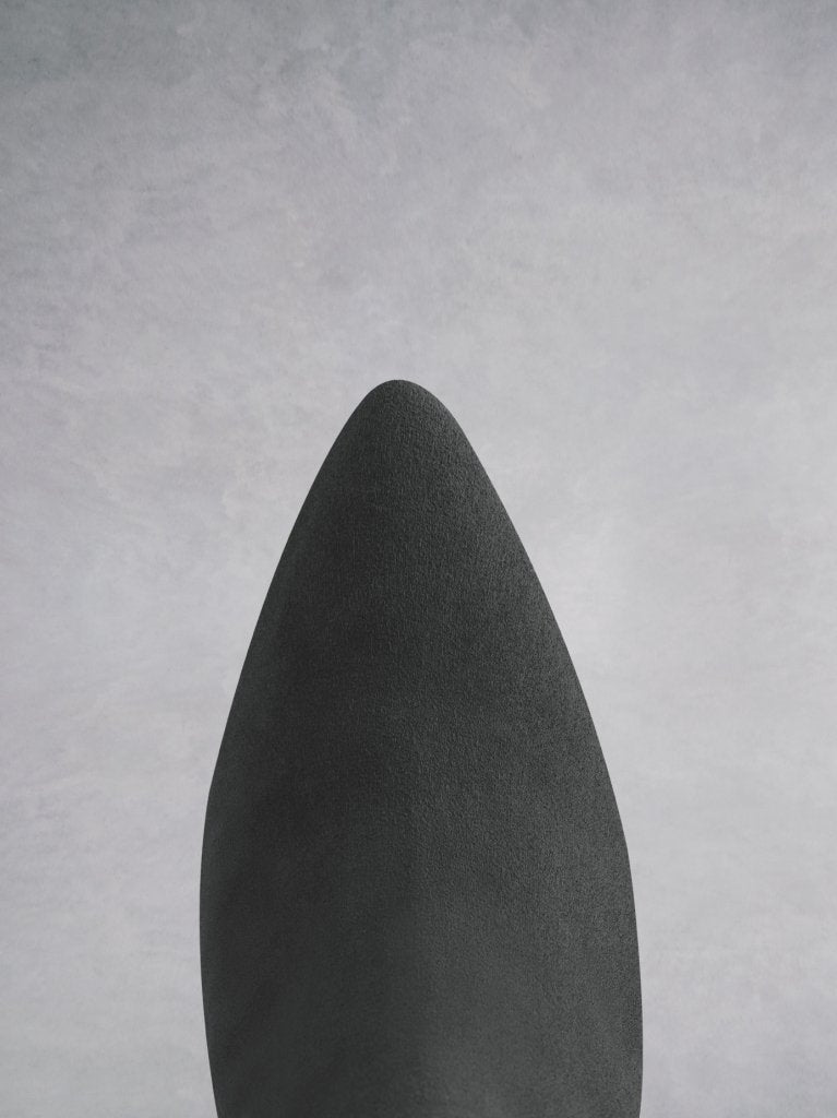The Fernworth features an elegant grey suede pointed toe. 