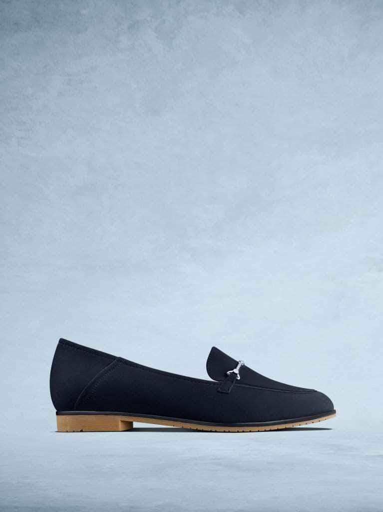 Fistral is our elegant navy suede pump with silver bar detailing. 