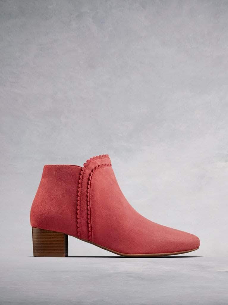 Florencia, our coral pink suede ankle boot with a scalloped edged trim.
