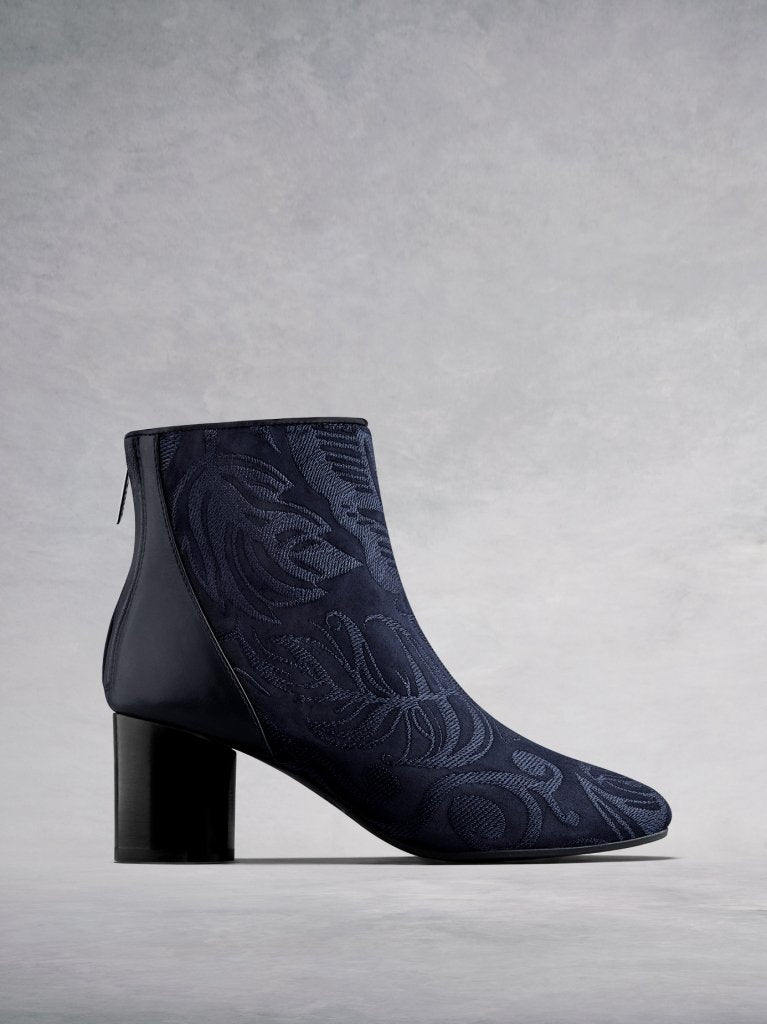 The Gosford, an embroidered navy suede and leather ankle boot.