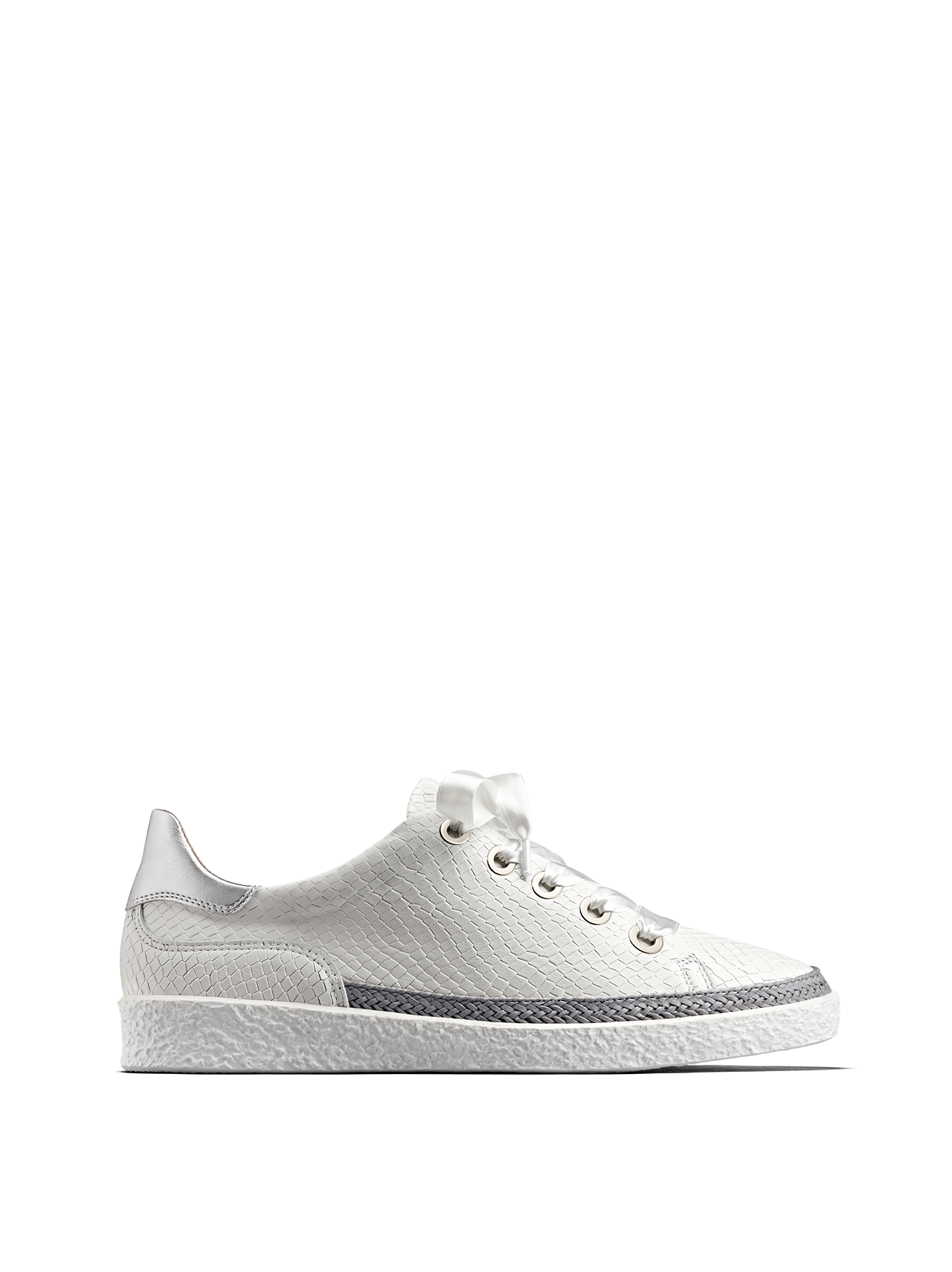 Harlyn, our statement white leather trainer with side zip fastening.