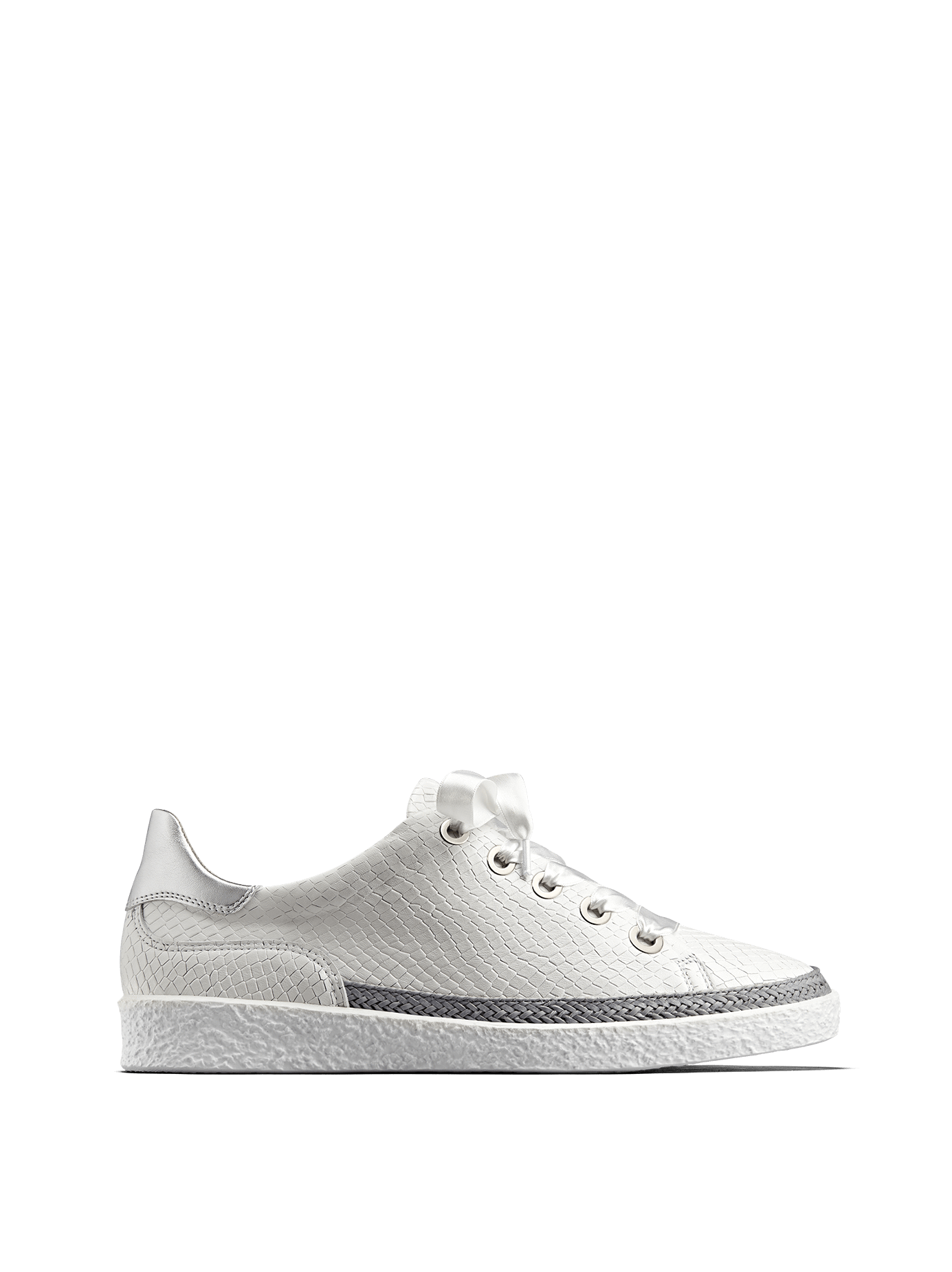 Harlyn, our statement white leather trainer with side zip fastening.