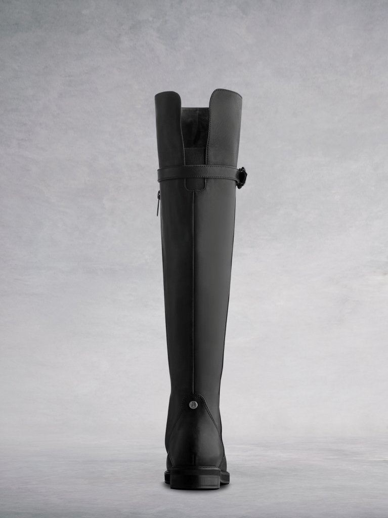 The boot back features the signature stud and narrow cut out panel.