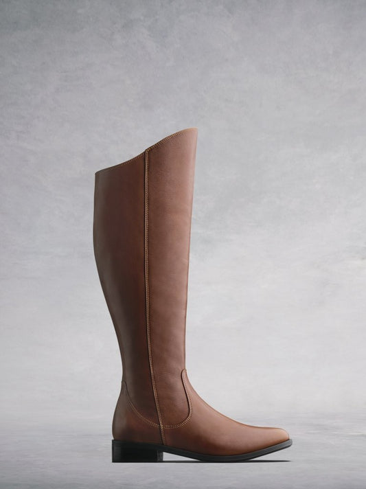The Huntsman - a classic tan leather knee high riding boot.