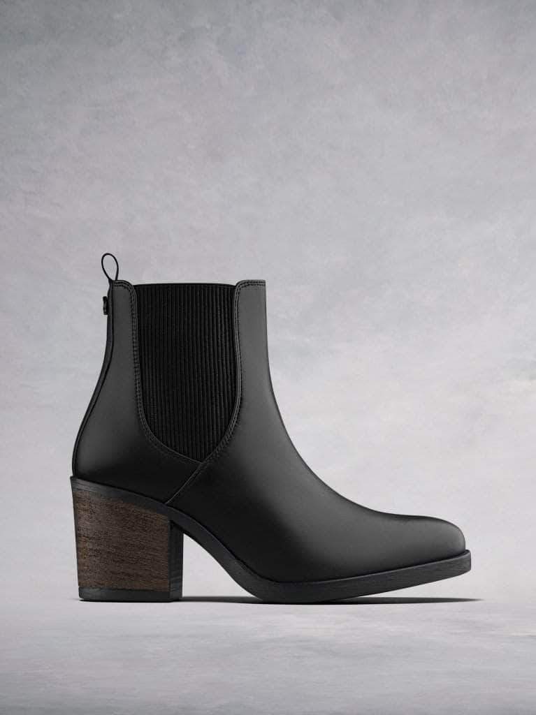 Isidor, our black leather high heeled Chelsea boot with textured elastic. 