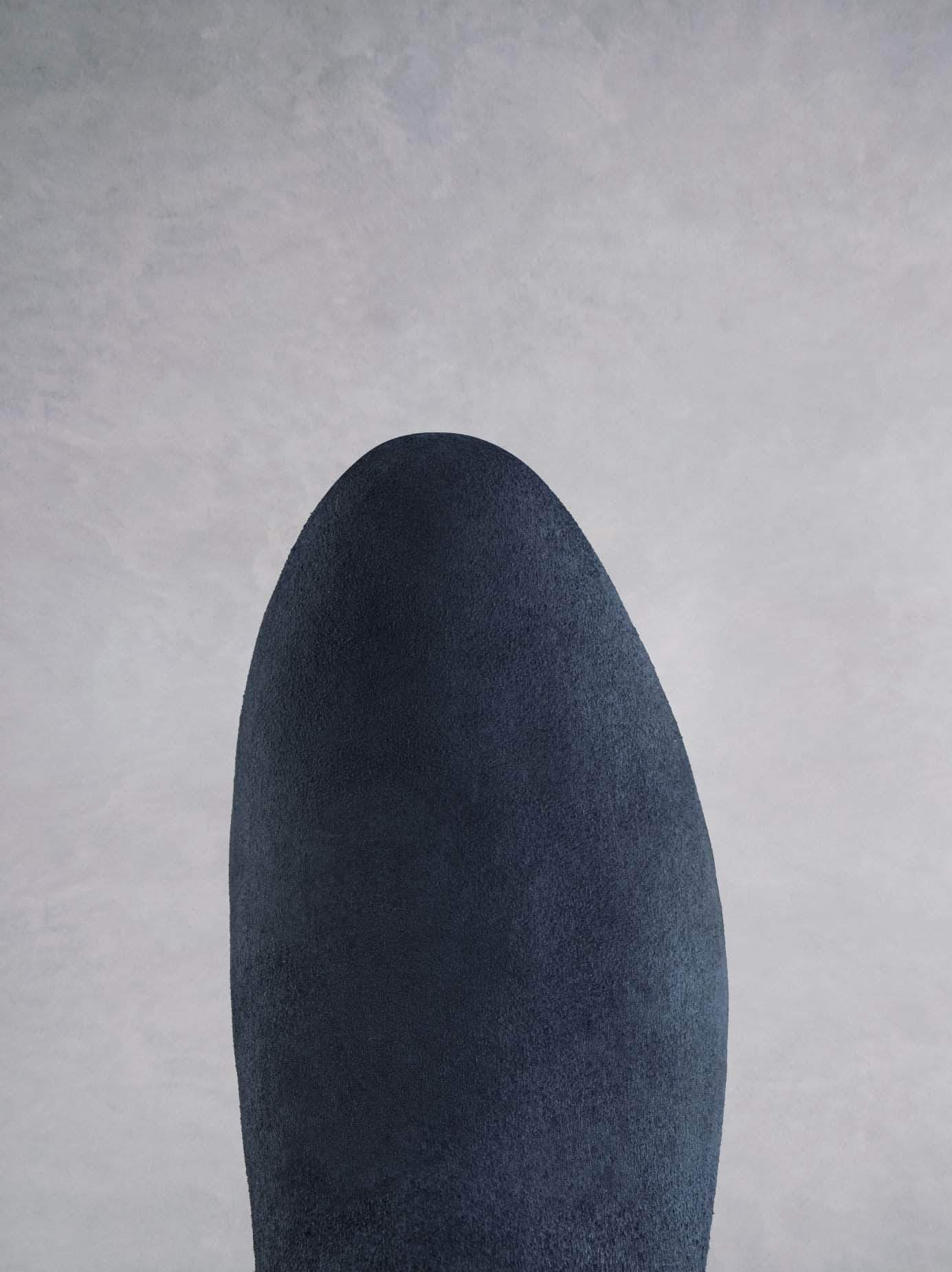 Kelston in navy suede has an almond toe and full length zip for easy wear.  