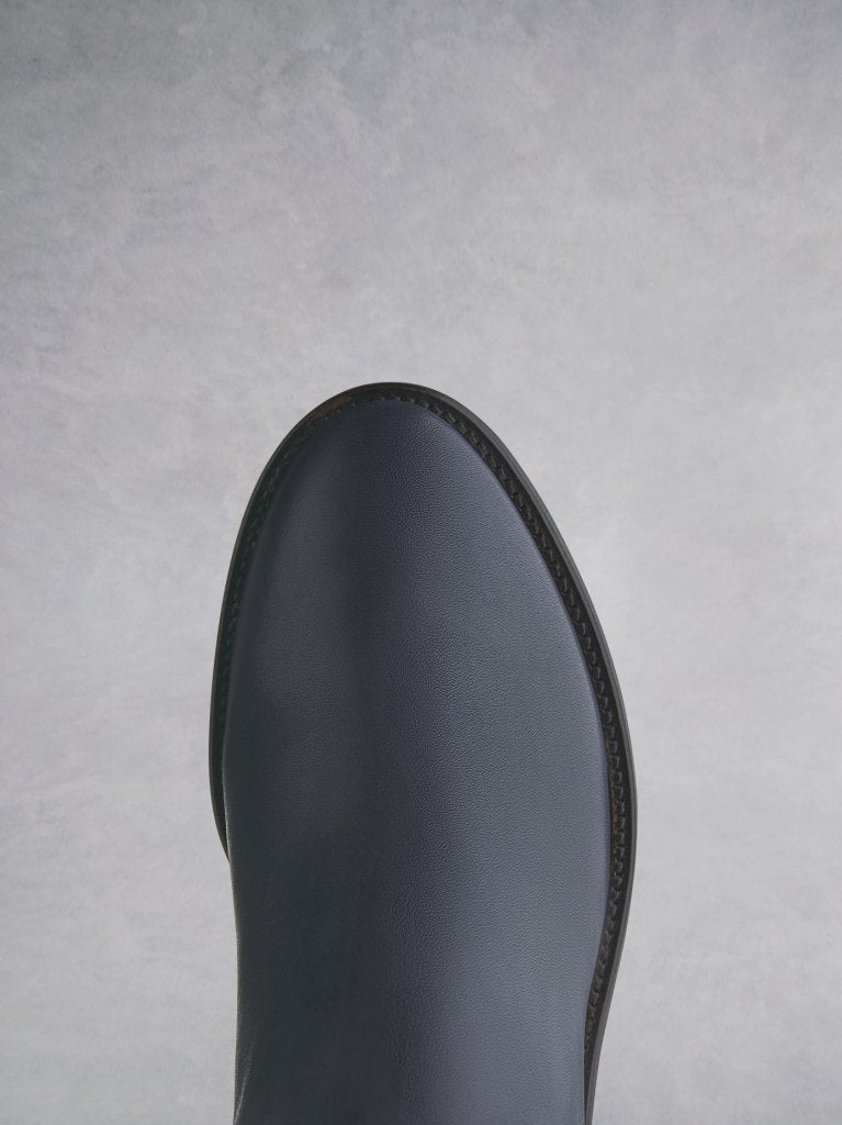 The navy boot has a stylish round toe - both comfortable and practical. 