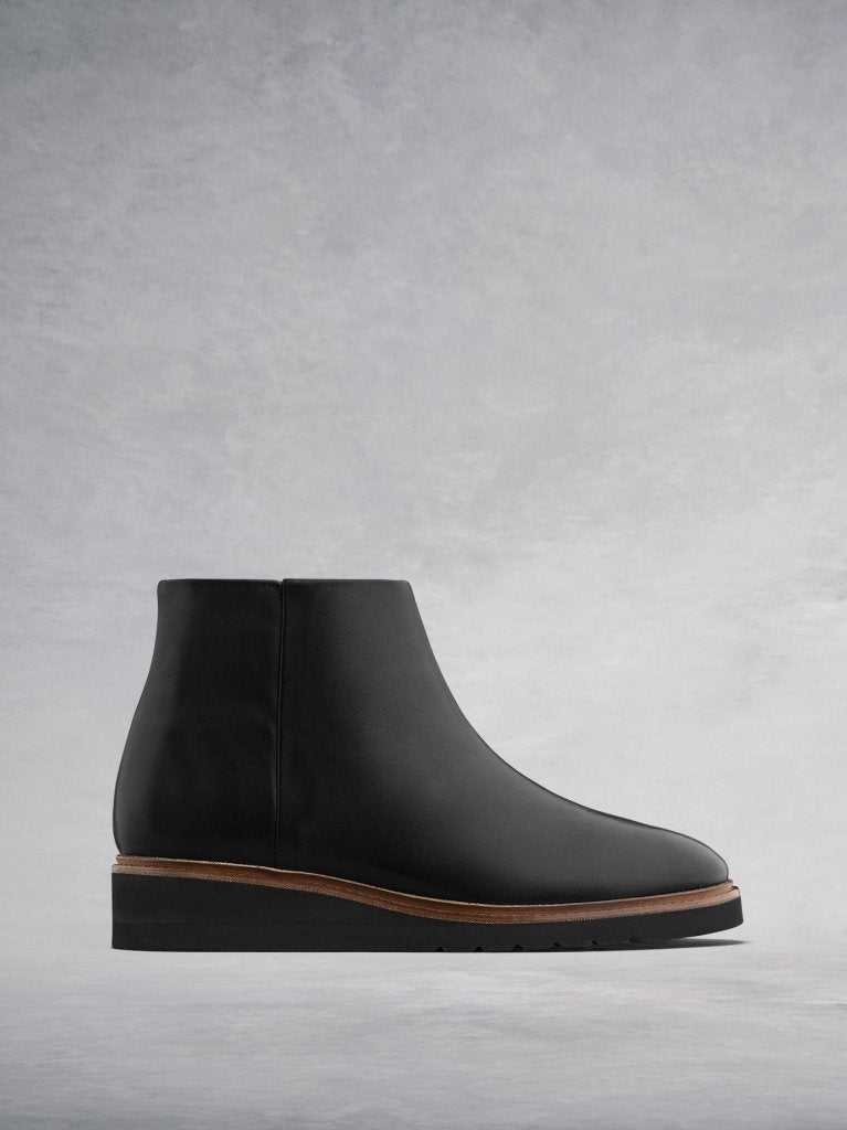 The Kielder, flat slide-on ankle boots in a luxurious black leather.