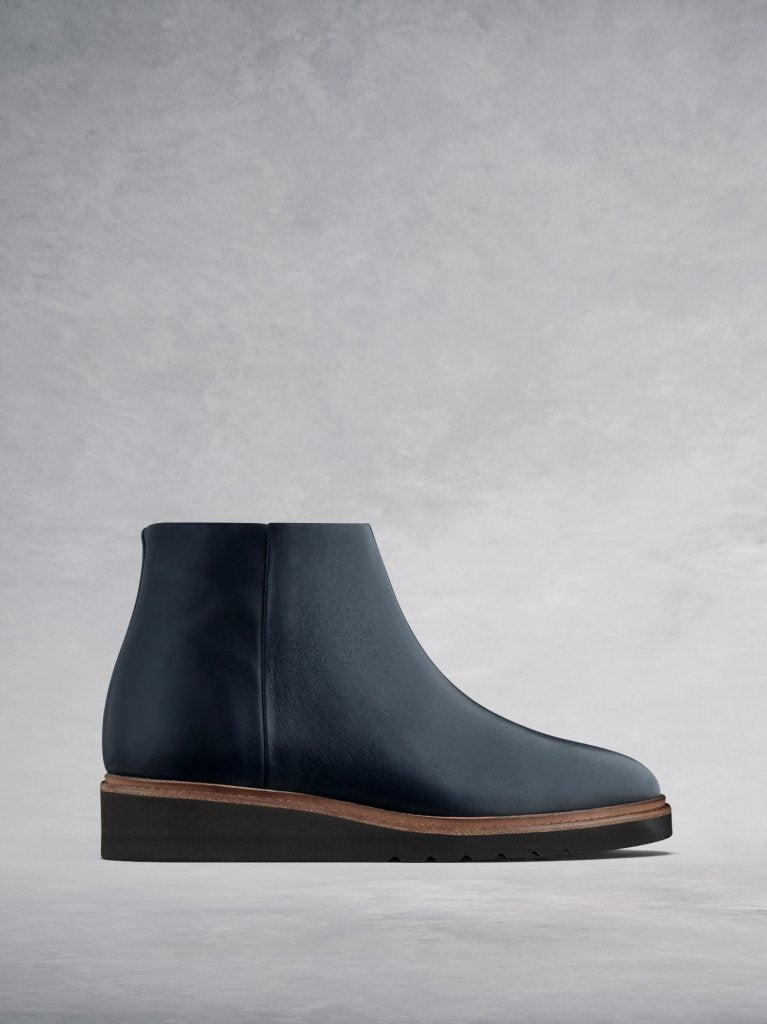 The Kielder, flat slide-on ankle boots in a luxurious navy leather.