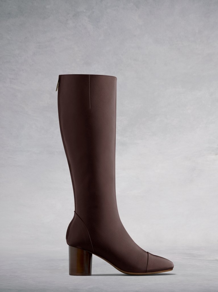 The Langley, a burgundy leather knee high boot with matching luxe lining. 
