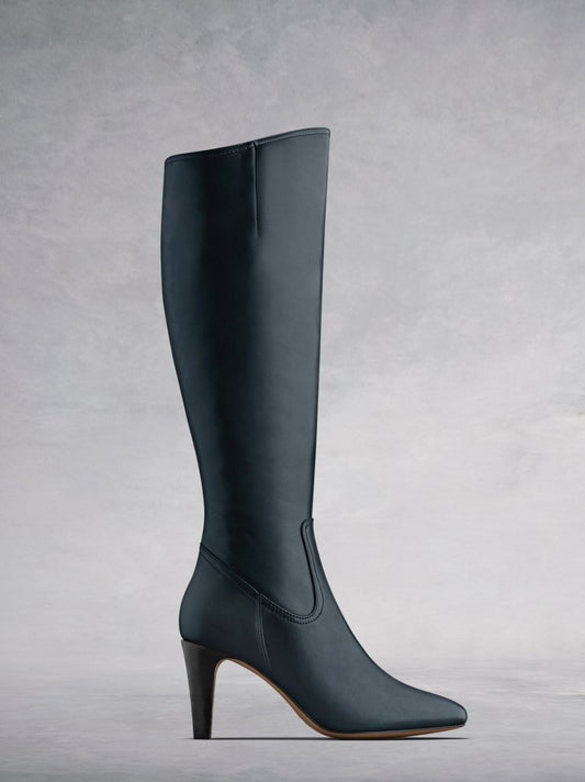 The Luxor, a versatile and timeless high heeled navy leather boot.